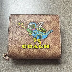 Coach Tan Wallet with Colorful Astronaut Graphic